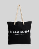 Billabong Pacific Beach Bag in Black front view showing the textured woven straw exterior paneling comfortable dual carry straps and metal brand logo badge layout, sold by Point Break Cambridge local family surf shop at 63 Duke street.