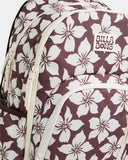 Billabong Playa Sol Roadie Backpack in Teak close up view highlighting the premium 600D recycled polyester fabric texture chocolate and neutral floral pattern quality stitching secure zippered compartments and signature Billabong flower rubber logo patch, sold by Point Break Cambridge local family surf shop at 63 Duke Street.