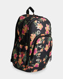 Billabong Sweet Tropics Roadie Backpack in Black Multi side profile view showcasing the spacious 31-litre storage capacity elasticated side water bottle pockets multiple zippered compartments and distinctive tropical floral print, sold by Point Break Cambridge local family surf shop at 63 Duke Street.