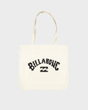 Billabong Tote Bag in Natural sand front view showing the textured woven straw exterior paneling comfortable dual carry straps and metal brand logo badge layout, sold by Point Break Cambridge local family surf shop at 63 Duke street.