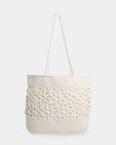 Billabong Wild Daisies Tote Bag in Salt Crystal back view highlighting the intricate crochet flower pattern soft neutral colourway spacious tote bag construction and relaxed bohemian-inspired coastal styling, sold by Point Break Cambridge local family surf shop at 63 Duke Street.