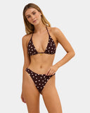 Billabong Womens Hot Shot Remi Tri Bikini Top in Teak front view showcasing the flattering sliding triangle cup silhouette, soft crepe-textured stretch swimwear fabric, delicate pineapple charm at the centre front and rich earthy brown colourway, available at Point Break Cambridge surf shop at 63 Duke Street.