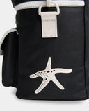 Billabong Womens La Lune Cooler Bag in Black Pebble close up view highlighting the durable 600D recycled polyester fabric texture distinctive black and white La Lune print insulated interior lining quality stitching and signature Billabong printed branding, sold by Point Break Cambridge local family surf shop at 63 Duke Street.