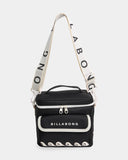 Billabong Womens La Lune Cooler Bag in Black Pebble front view showcasing the distinctive black and white patterned design durable recycled polyester construction practical front storage pocket and signature Billabong printed logo, sold by Point Break Cambridge local family surf shop at 63 Duke Street.