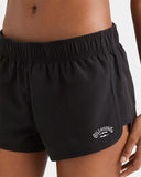 Billabong Womens Legacy Boardshorts in Black close up view highlighting the premium eco-friendly recycled stretch fabric weave texture branded metal eyelets and heavy duty reinforced stitching finishes, sold by Point Break Cambridge local family surf shop at 63 Duke street.