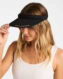 Billabong Womens Pacific Beach Visor in Black front view showing the textured woven straw sun brim open crown architecture and metal brand logo badge layout, sold by Point Break Cambridge local family surf shop at 63 Duke street.