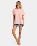 Billabong Womens Pacific Tee in Pale Peach front view showcasing the soft pastel peach colourway relaxed short sleeve silhouette classic crew neckline ribbed neckband and signature Billabong chest print, sold by Point Break Cambridge local family surf shop at 63 Duke Street.