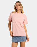 Billabong Womens Pacific Tee in Pale Peach front view showcasing the soft pastel peach colourway relaxed short sleeve silhouette classic crew neckline ribbed neckband and signature Billabong chest print, sold by Point Break Cambridge local family surf shop at 63 Duke Street.