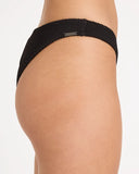 Billabong Womens Summer Hi Bondi Bikini Bottom in Black Sands charcoal black close up view highlighting the premium soft ribbed texture fabric weave pattern, seamless edge lining, and metal brand logo badge detail, sold by Point Break Cambridge local family surf shop at 63 Duke street.