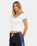 Billabong Womens Surf Vibe V Neck Tee in Salt Crystal side profile view showcasing the flattering fitted t-shirt silhouette comfortable cap sleeves contrast sleeve band detailing and premium cotton jersey construction for effortless coastal styling, sold by Point Break Cambridge local family surf shop at 63 Duke Street.