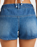 Billabong Womens Wave Bound Short in Dark Denim close up view highlighting the premium lightweight cotton fabric weave texture detailed drawcord tips and subtle embroidered brand logo accents, sold by Point Break Cambridge local family surf shop at 63 Duke street.