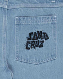 Close-up of a light blue denim back pocket with black embroidered 'SANTA CRUZ' lettering on the pocket. Santa Cruz Yelling Stack Baggy Denim Jeans - Mid Blue Denim
