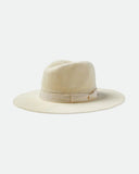 Brixton Lyons Knit Packable Hat in Natural straw front view showing the structured teardrop crown subtle downtick brim premium grosgrain band and custom metal headwear plaque layout, sold by Point Break Cambridge local family surf shop at 63 Duke street.