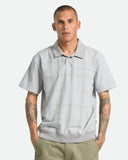 Brixton Trolly Jacquard Weekend Polo in Blue Aura teal front view showing the comfortable collared neck three button placket layout and regular casual silhouette drape, sold by Point Break Cambridge local family surf shop at 63 Duke street.