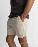 Model wearing the Rhythm Mens Classic Linen Jam Short - Sand on a plain background