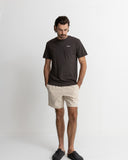 Model wearing the Rhythm Mens Classic Linen Jam Short - Sand on a plain background