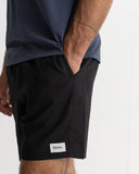 Model wearing the Rhythm Mens Classic Linen Jam Short - Vintage Black on a plain background