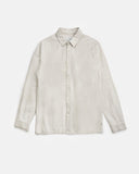 A light beige long-sleeve button-up shirt with a classic collar, laid flat against a clean, light gray background. Rhythm Men's Classic Linen LS Shirt – Sand