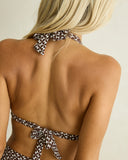 Model wearing the Rhythm Dreamer Halter Top - Chocolate on a plain background