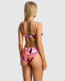 Sea Level Neon Wave Cross Front Multifit Bra bikini top in vibrant Berry pink displayed at Point Break Cambridge.