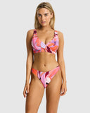 Sea Level Neon Wave Cross Front Multifit Bra bikini top in vibrant Berry pink displayed at Point Break Cambridge.