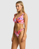 Sea Level Neon Wave Cross Front Multifit Bra bikini top in vibrant Berry pink displayed at Point Break Cambridge.