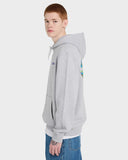 Person wearing a gray hoodie with colorful designs on a white background