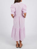 Back view of the women's Elm Ottilie tiered dress showing the relaxed flowy drape and clean shoulder line.