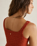 Model wearing the Rhythm Gigi Lace Tie Side Top - Red on a plain background