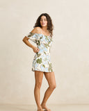 Side profile of the blue floral Rhythm Gigi Skirt detailing the flat hip fit and hidden side zip closure.