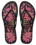 Havaianas Slim Organic Jandals in Black Pink Lemonade 2718 front view showing the elegant open toe thong configuration, vibrant floral print footbed, and delicate slim pink straps, sold by Point Break Cambridge local family surf shop at 63 Duke street.