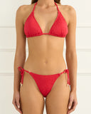 Heaven Cinabar Bella Triangle Top in Red bikini swimsuit close up view highlighting the premium smooth solid swim fabric weave, high quality red strap stitching, and fully lined interior detail, sold by Point Break Cambridge local family surf shop at 63 Duke street.