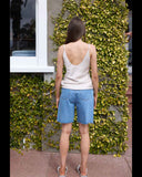 Back view of the Honey Denim Belle Denim Jort in Blue J85 highlighting the pocket placement and clean denim drape.