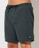 Hurley Beach Staple Boardshort in Black close up view highlighting the premium quick-dry stretch fabrication weave fabric texture precise surf-tie grommet stitching and stitched brand logo accents, sold by Point Break Cambridge local family surf shop at 63 Duke street.