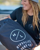 Hyperlite Heater Boat Blanket in Black reverse interior view showing the ultra-soft insulating fleece lining texture and clean perimeter stitching construction lines, sold by Point Break Cambridge local family surf shop at 63 Duke street.