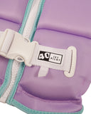 Jetpilot Freeride Girls Youth Eco Vest in Purple close up view highlighting the premium Ecoprene fabric texture, durable YKK front zipper, detailed stitch-through panel construction, vibrant purple gradient print and signature Jetpilot branding, sold by Point Break Cambridge local family surf shop at 63 Duke Street.
