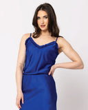 Leila + Luca Cami in Cobalt Satin blue front view showing the elegant relaxed sleeveless silhouette flattering tailored neckline and clean casual flowing lower satin hemline profile, sold by Point Break Cambridge local family surf shop at 63 Duke street.