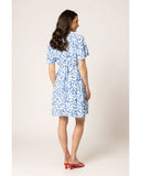 Leila + Luca Gathering Dress in Bold Blue Spot back view showing the elegant relaxed drape premium patterned fabric alignment and clean structural bodice paneled tailoring with flatlock seam stitching, sold by Point Break Cambridge local family surf shop at 63 Duke street.