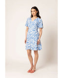 Leila + Luca Gathering Dress in Bold Blue Spot front view showing the elegant relaxed midi length silhouette flattering tailored neckline and clean casual flowing lower polka dot print hemline profile, sold by Point Break Cambridge local family surf shop at 63 Duke street.