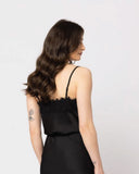 Leila + Luca Lace Cami in Black back view showing the elegant relaxed drape premium dark fabric alignment and clean structural rear panel tailoring with flatlock seam stitching, sold by Point Break Cambridge local family surf shop at 63 Duke street.