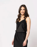 Leila + Luca Lace Cami in Black side profile view highlighting the comfortable mid rise height clean outseam stitching paneling and functional deep fluid drape stealth black silhouette lines, sold by Point Break Cambridge local family surf shop