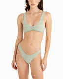 A model wearing a two-piece bikini with a green and white gingham check pattern, shown against a plain white background. Rhythm Lola Check Crop Bikini Top - Green