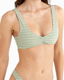 A close-up of a model wearing a green and white gingham bikini top with a twisted front detail, paired with matching bikini bottoms partially visible at the bottom edge. Rhythm Lola Check Crop Bikini Top - Green