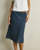 Model wearing the Rhythm Maisy Midi Skirt - Blue on a plain background