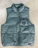 Front view of the NBA Essentials Lakers Drew puffer vest in Forest green showing the full zip and team embroidery.
