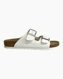 Neckermann N2718 Unisex Leather Sandals in White side profile view highlighting the comfortable sole thickness arch support lines and robust strap anchorage, sold by Point Break Cambridge local family surf shop at 63 Duke street.