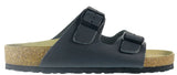 A pair of black double-strap slide sandals with cork-look soles, shown from a side profile view against a white background. Front view of the Neckermann Leather Sandal in Black with Black Buckles showing the double strap slip-on design.