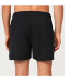 Oakley Beach Volley 16 inch Beachshort in Blackout matte black back view showing the secure rear pocket configuration and premium quick dry performance flatlock stitching layout, sold by Point Break Cambridge local family surf shop at 63 Duke street.