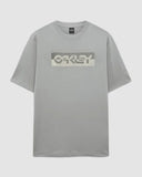 Oakley Duality B1B Tee in Cement grey front view showing the comfortable ribbed crew neck and custom dual chest graphic logo layout, sold by Point Break Cambridge local family surf shop at 63 Duke street.