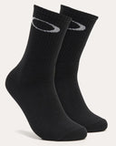 Oakley Ellipse Crew Sock in Blackout front view showing the ribbed ankle cuffs and signature knitted front ellipse logo branding, sold by Point Break Cambridge local family surf shop at 63 Duke street